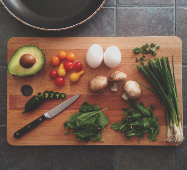 Fresh produce on a wooden cutting board